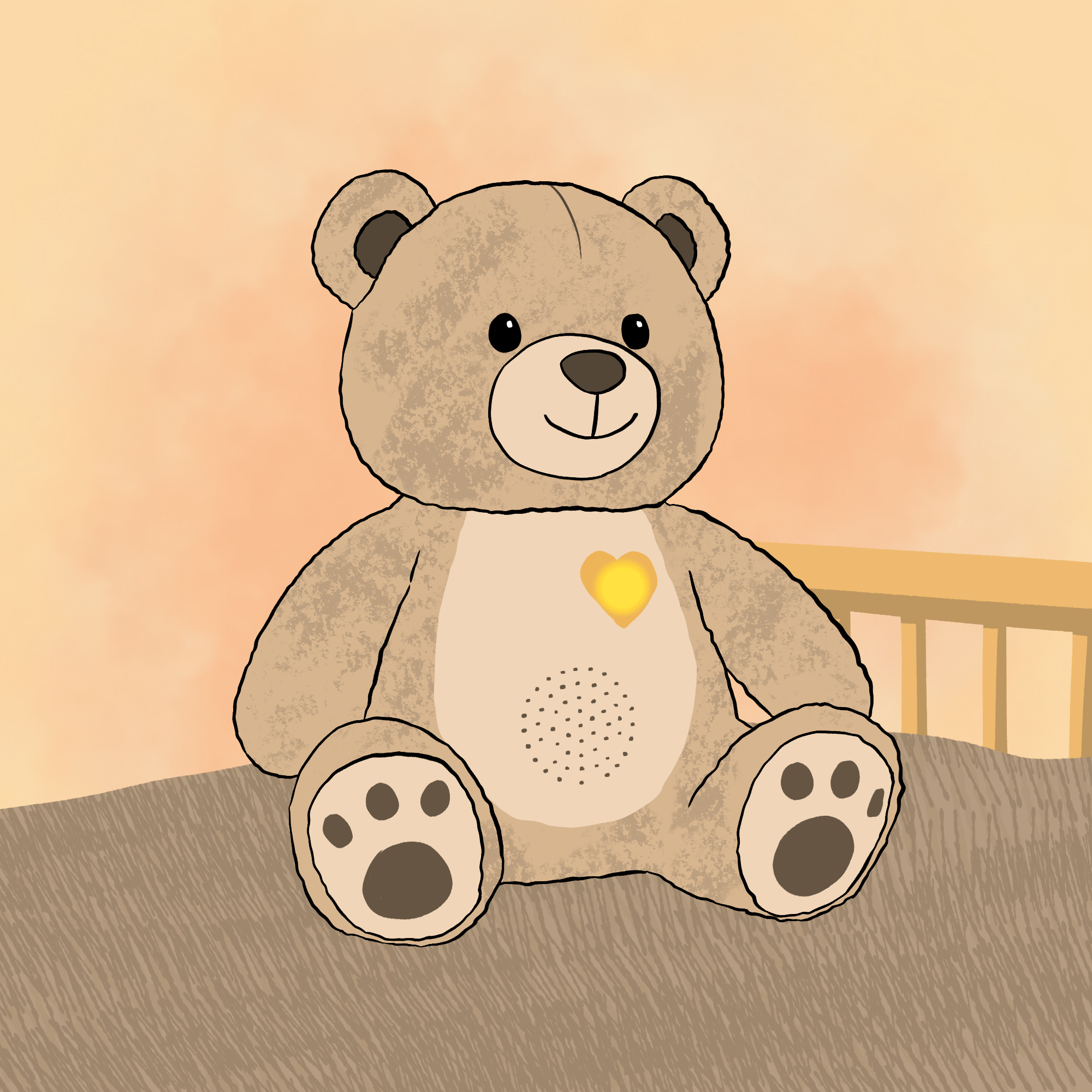 A soft toy bear is sitting on a table, it has brown fur. On the bear’s tummy are some black dots in a circle as it contains a speaker. The bear has a light-up golden heart on its front.